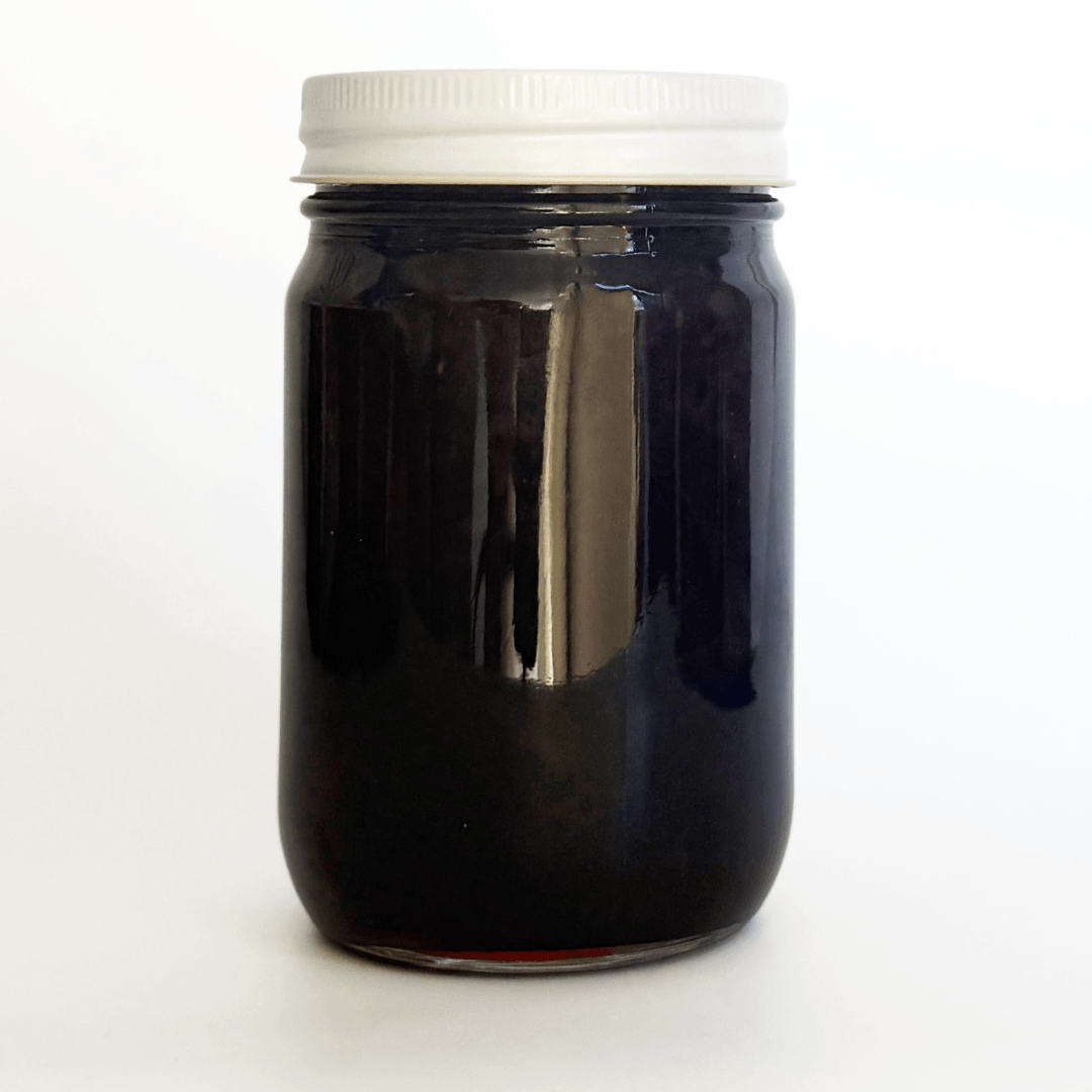 Back of the cherry raspberry jar of jelly