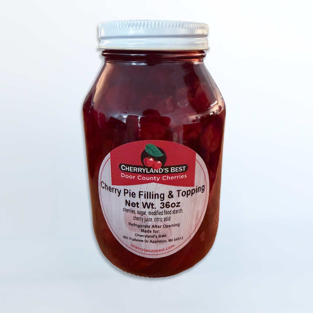 Glass jar of Cherry Pie filling on a white background