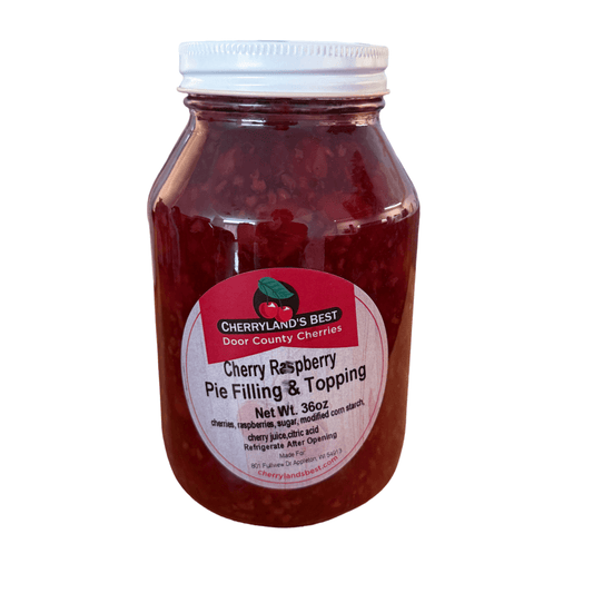 A glass jar of Cherryland's Best Door Country Cherries Cherry Raspberry Pie Filling & Topping with a white lid and a white label, shown against a plain white background.