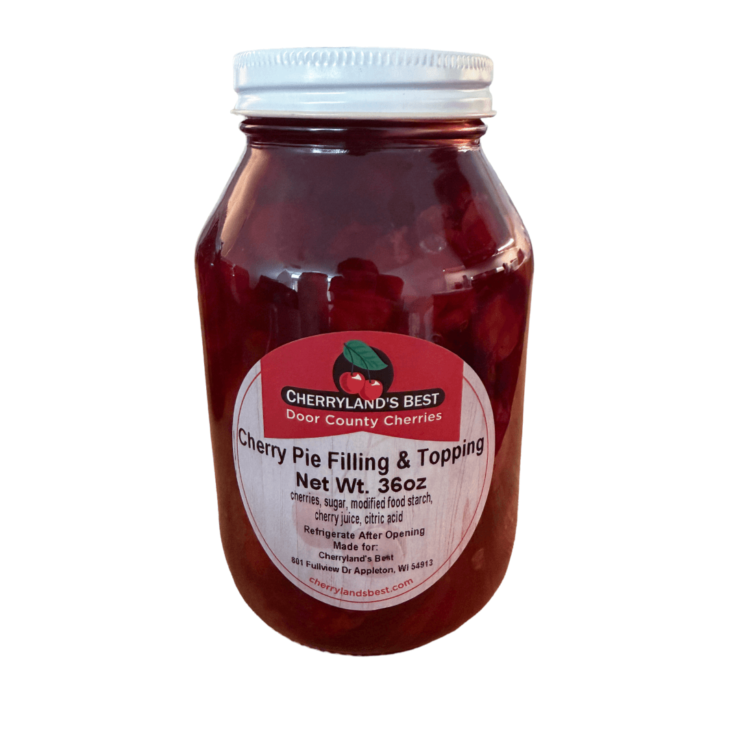 A glass jar of Cherry Pie Filling & Topping by Cherryland's Best Door County Cherries, filled with dark red cherries and topped with a white lid, on a white background.