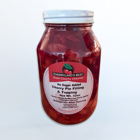 A 32 oz glass jar of Cherryland's Best No Sugar Added Cherry Pie Filling & Topping, filled with red cherries and topped with a white lid, set against a light gray gradient background.