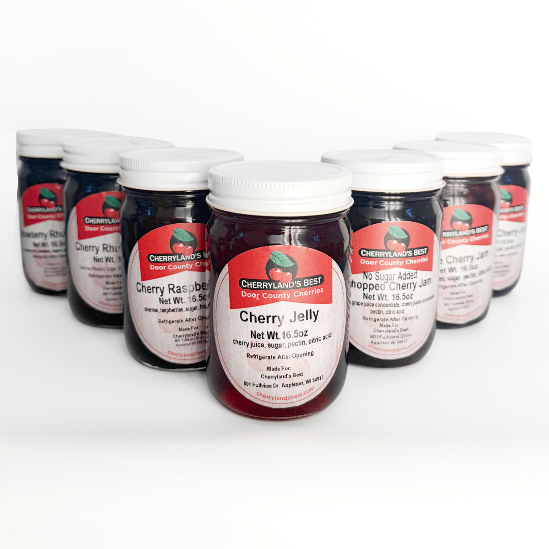 A group of Cherrylands' Beef cherry jam jars arranged on a white background, with the front jar labeled Cherry Jelly.