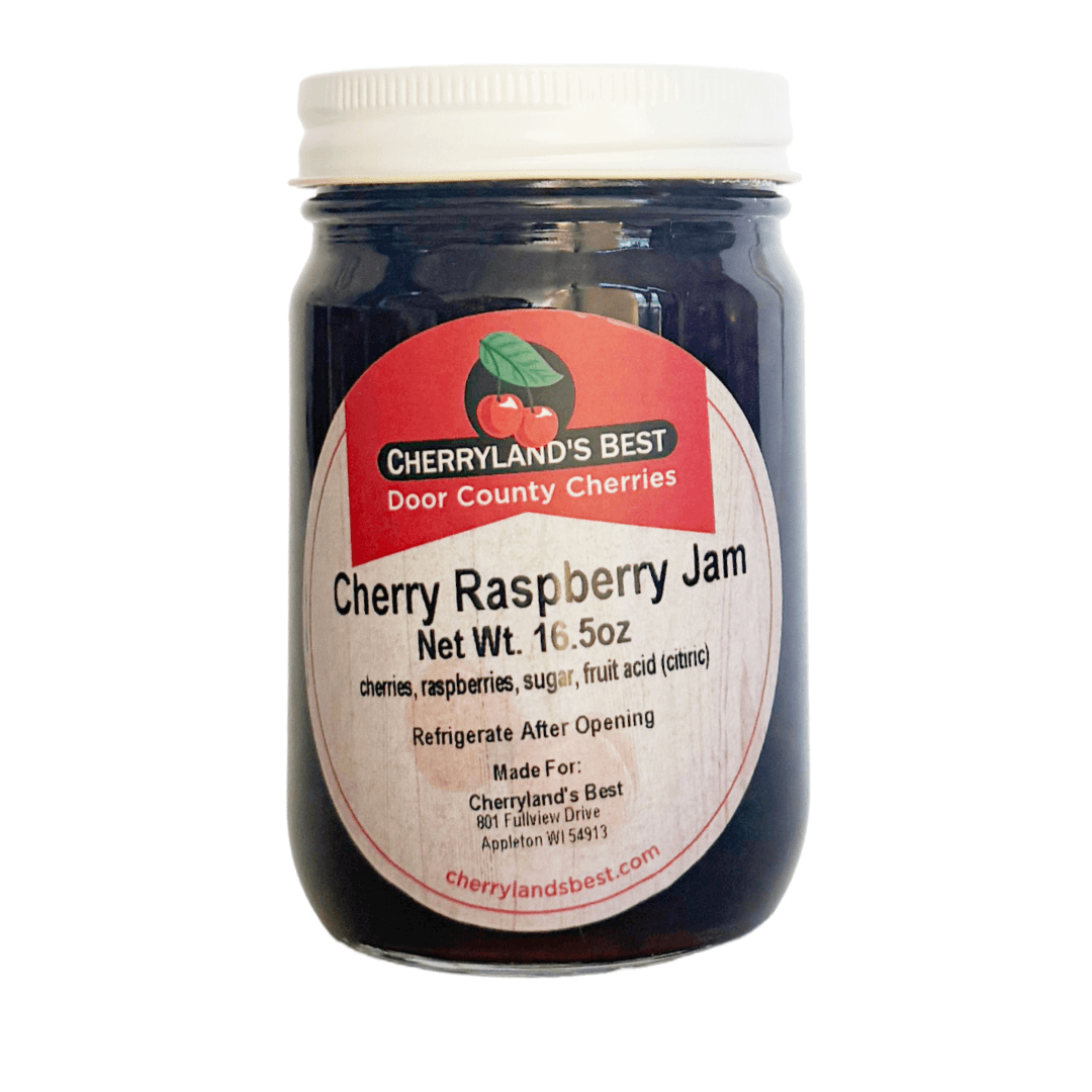 A glass jar of Cherry Raspberry Jam by Cherryland's Best, featuring a white ribbed screw cap and a white label with red and black text, set against a plain white background.