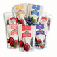Six bags of Nature's Path dried fruit mixes arranged in a fan shape on a white background. The products include Milk & Dark Chocolate Cranberry, Sweetened Dried Cherries, Dried Blueberries, Chocolate Cherry Nut Mix, and Cherry Berry Mix.